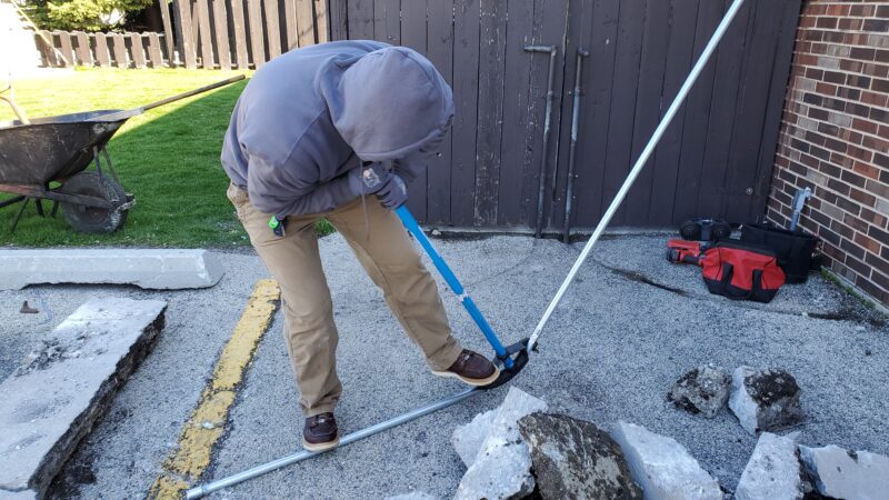 Electrician bending conduit pipes.